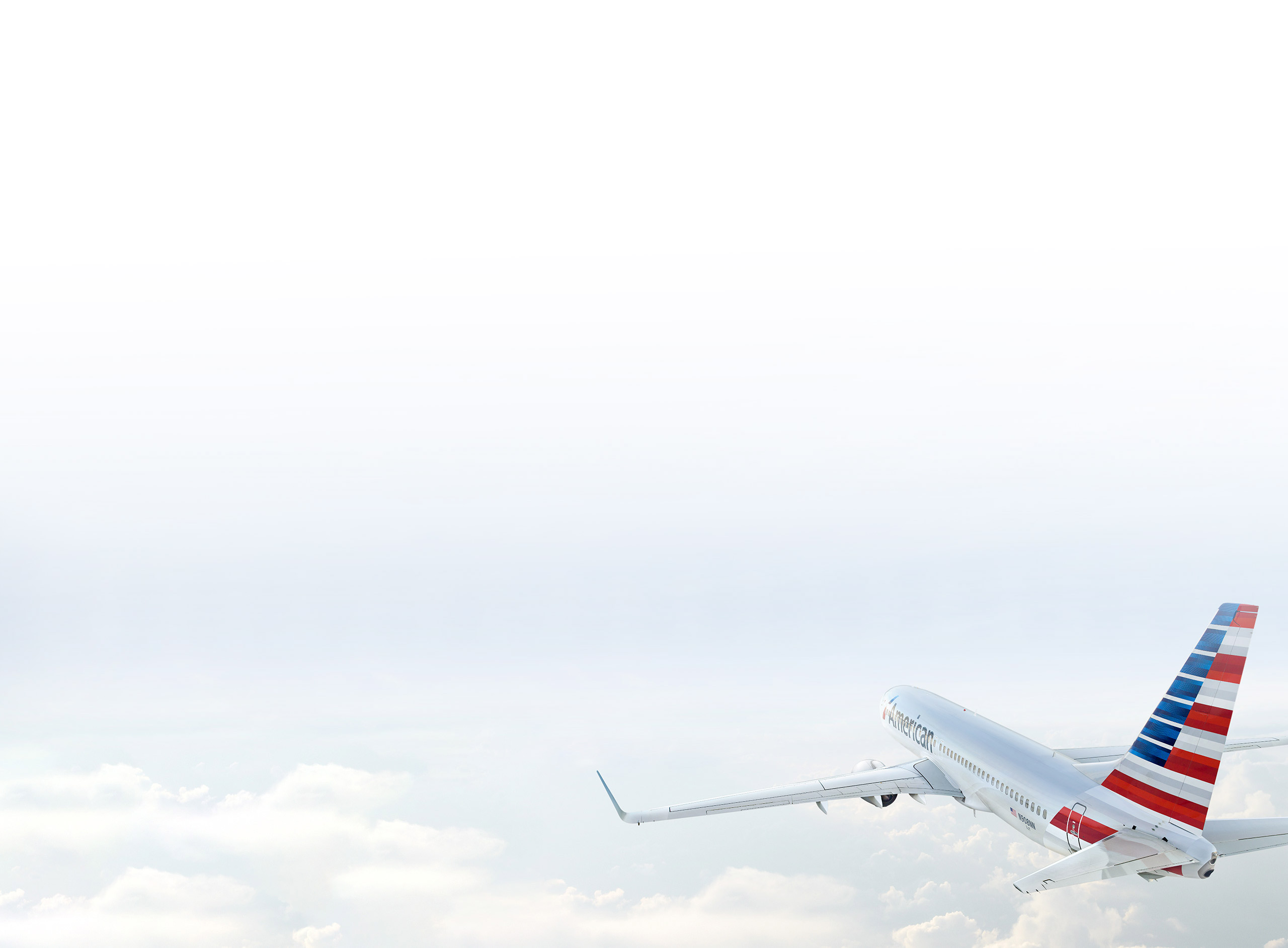 Airplane flying over clouds